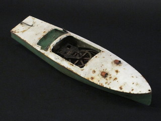 A tin plate clock work model of a motor boat 16"