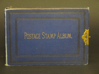 A blue Lincoln stamp album containing a collection of World stamps