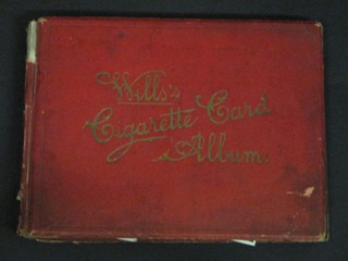 A red album of cigarette cards