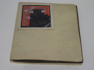 A black and white photograph album relating to travels in India