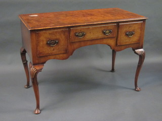 A Queen Anne style walnut side table with crossbanded top,  fitted 1 long and 2 short drawers, raised on cabriole supports 42"