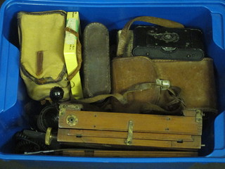 A Certo Dollina camera, a Kodak folding camera, a box camera  and other photograph equipment