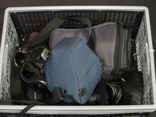 A Praktica LTL camera and lens, a Canon EOS1000F and other cameras