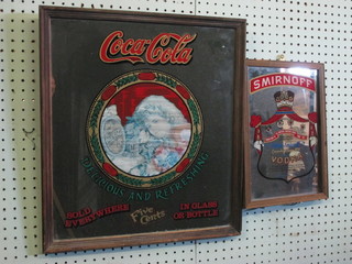 A reproduction pub mirror marked Smirnoff 11" x 8" together  with 1 other Coca Cola 15" x 15"