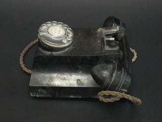 A black Bakelite wall mounting telephone, the reverse marked  N8460 AIT