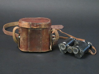 A pair of field glasses marked F Akenhead 5th Manchester Regt. complete with leather carrying case