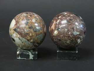 A pair of turned granite spheres 4"