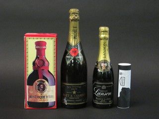 A bottle of 1978 Moet & Chandon champagne, a half bottle of  Lanson champagne, a miniature bottle of Black Grouse Whisky  and a bottle of Gran Duque Dalaba