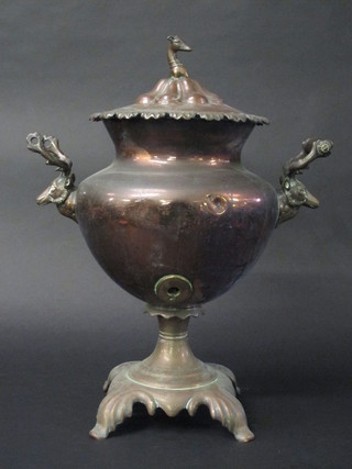 A Georgian copper twin stag handled tea urn the finial in the  form of a greyhounds head