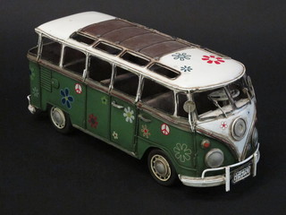 A 1960's style painted VW camper van model 12"