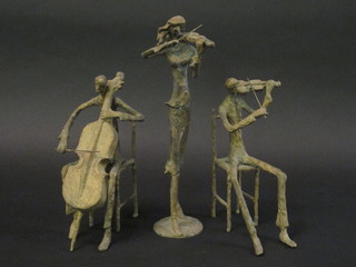 3 gilt painted metal sculptures of musicians 10"