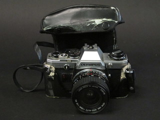 An Olympus OM10 camera