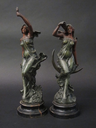 A pair of Edwardian French spelter figures depicting Day and  Night 13"