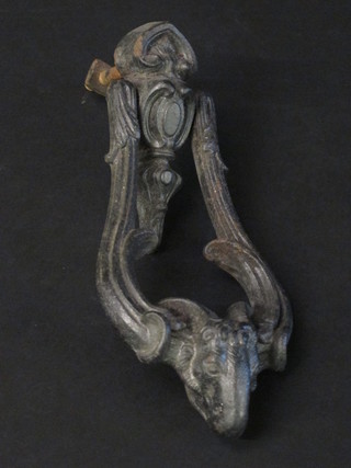 A Victorian iron door knocker