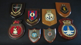 8 various military wall plaques