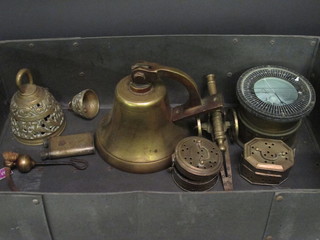 An Air Ministry compass marked bombsite D, a brass bell and a  small collection of brassware