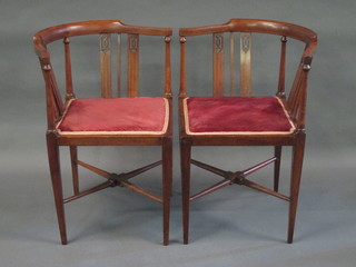 A pair of Edwardian inlaid mahogany corner chairs