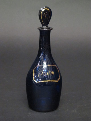 An 18th/19th Century Bristol blue glass club shaped rum decanter  and stopper, decanter chipped,