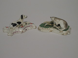 2 19th Century porcelain figures of a seated greyhound and  hound, raised on cushions 5", both f and r,