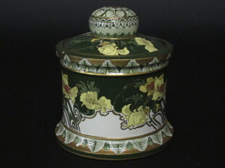 A circular Royal Doulton green and floral pattern biscuit barrel  8"
