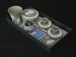 A circular green Jasperware jar and cover 4", pair of Jasperware stub shaped candlesticks 3 1/2", 2 Jasperware pin trays 6", oval  dish 4" and a cigarette lighter