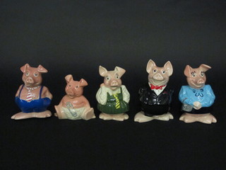 A set of 5 Wade Nat West Piggy Banks