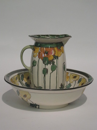 A Royal Doulton jug and bowl set decorated poppies, the base marked D3227, star chip to base of bowl,