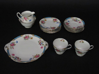 A 21 piece Shelley Blue Princess pattern tea service the base  marked 14026 comprising twin handled plate 9", 6 tea plates 6",  6 cups and 6 saucers - 1 cup cracked, sugar bowl and cream jug