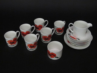 A 17 piece Wedgwood Susie Poppy design coffee service comprising 3 tea plates 6 1/2", 6 cups and 6 saucers, cream jug  and sugar bowl and a small collection of glassware
