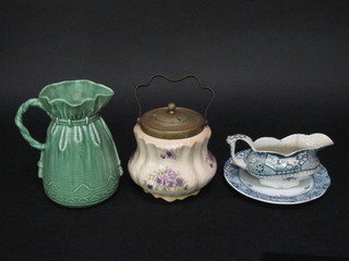 A part Duchess Violet pattern tea service, chamber pot, green glazed Sylvac pottery vase 8", a pottery biscuit barrel, part blue  and white dinner service and other decorative ceramics