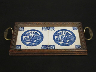 A rectangular oak tea tray with brass handles set 2 blue and  white Willow pattern tiles marked St Dunstons 13"