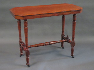 A Victorian mahogany lozenge shaped stretcher table raised on  turned supports with H framed stretcher 36"