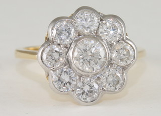 An 18ct white gold cluster dress ring, approx 1.50ct