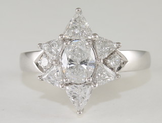 An 18ct white gold dress ring set diamonds in a floral design,  approx 1.65ct