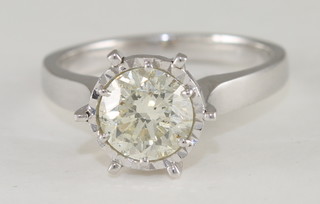 A lady's 18ct white gold dress/engagement ring set a solitaire diamond, approx 1.27ct