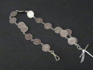 A watch chain formed from Victorian Indian silver Anas