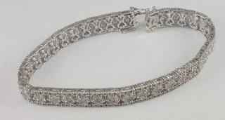 An Edwardian style 18ct white gold bracelet set numerous  diamonds, approx 7.35ct