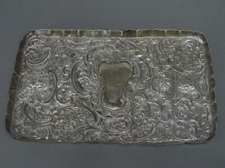 A Victorian rectangular embossed silver dressing table tray,  London 1895, 8 ozs