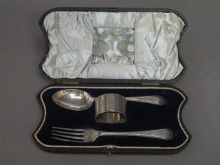 A Victorian 3 piece silver christening set comprising spoon, fork and napkin ring, Sheffield 1896 and 1899, 2 ozs, cased