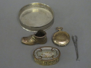 An engraved gold plated watch case, a circular silver plated  bottle coaster, a gilt metal trinket box etc