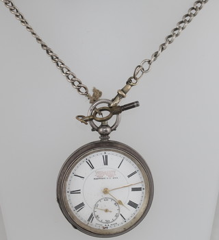 An open face pocket watch with silver dial and Roman numerals  by Vera City, contained in a Continental silver case hung on a  silver chain