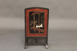 An Oriental ebonised and lacquered fire screen depicting an  interior scene 16 1/2"