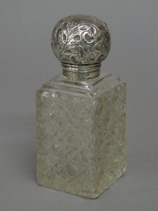 An Edwardian square hobnail cut glass scent bottle with silver  lid, Birmingham 1910