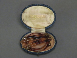A pair of Spillers "tortoiseshell" and 9ct gold folding spectacles