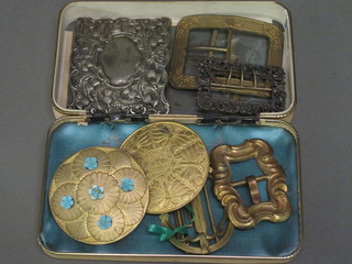 A collection of belt buckles