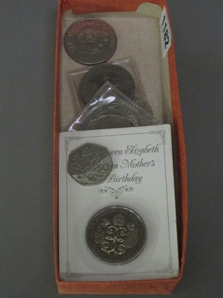 A collection of crowns, commemorative coins etc
