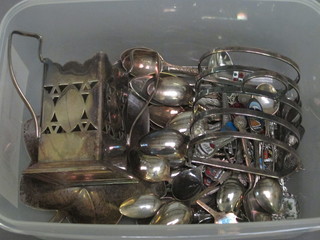 A collection of souvenir spoons and small items of plate