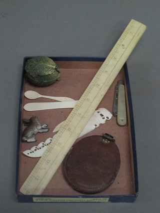 An ivory 12" rule, a folding fruit knife with silver blade and  mother of pearl grip, a Diaphot exposure meter and a metal ink  well in the form of a cabbage with a figure of rabbit etc