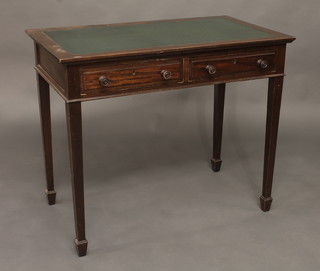 An Edwardian mahogany writing table with inset writing surface  fitted 2 long drawers and raised on square tapering supports  ending in spade feet 36"