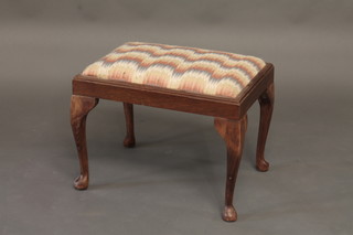 A rectangular mahogany footstool with upholstered drop in seat,  raised on cabriole supports 20"